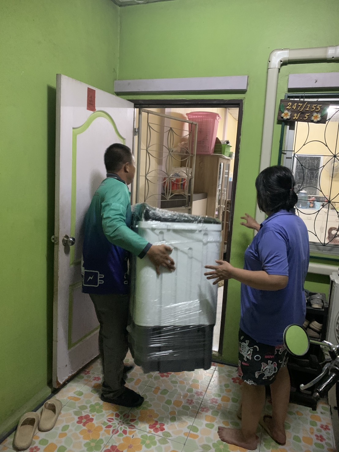 Carrying washer into customer home