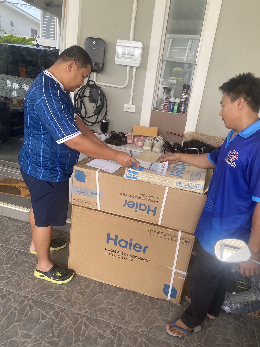 Delivering Haier air conditioner with warranty docs